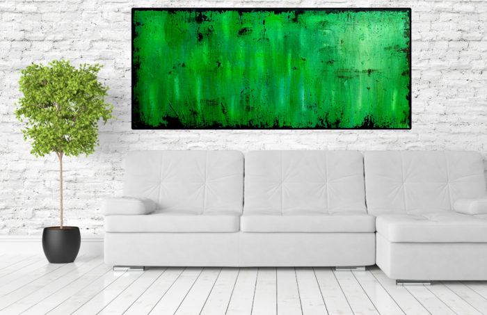 green abstract painting above bed